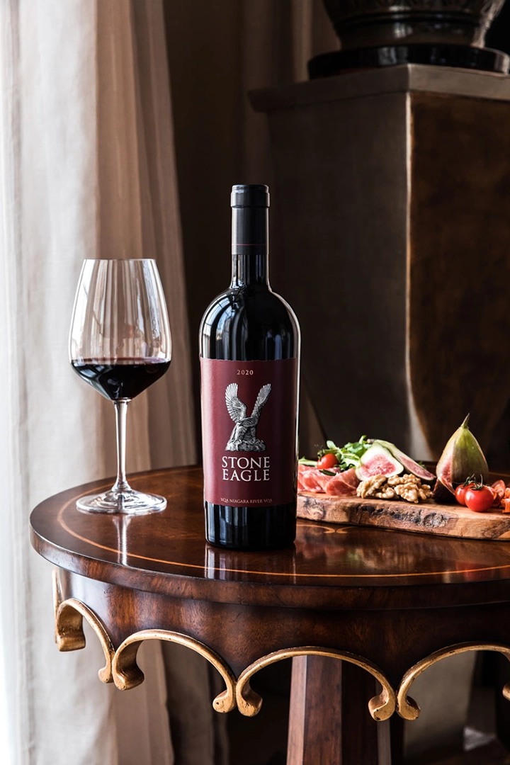 Stone Eagle red wine bottle and glass