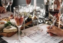 2026 Vol. 1 Elegant wine tasting event with cheese platter and detailed tasting notes for a refined experience.