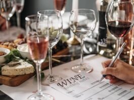 Elegant wine tasting event with cheese platter and detailed tasting notes for a refined experience.