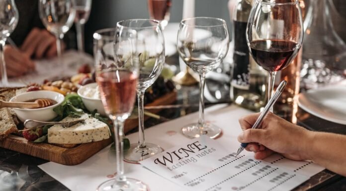 2026 Vol. 1 Elegant wine tasting event with cheese platter and detailed tasting notes for a refined experience.